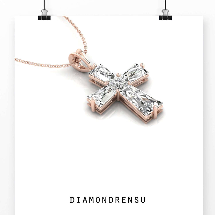 Gold diamond pendant in cross form with fine prong detailing.