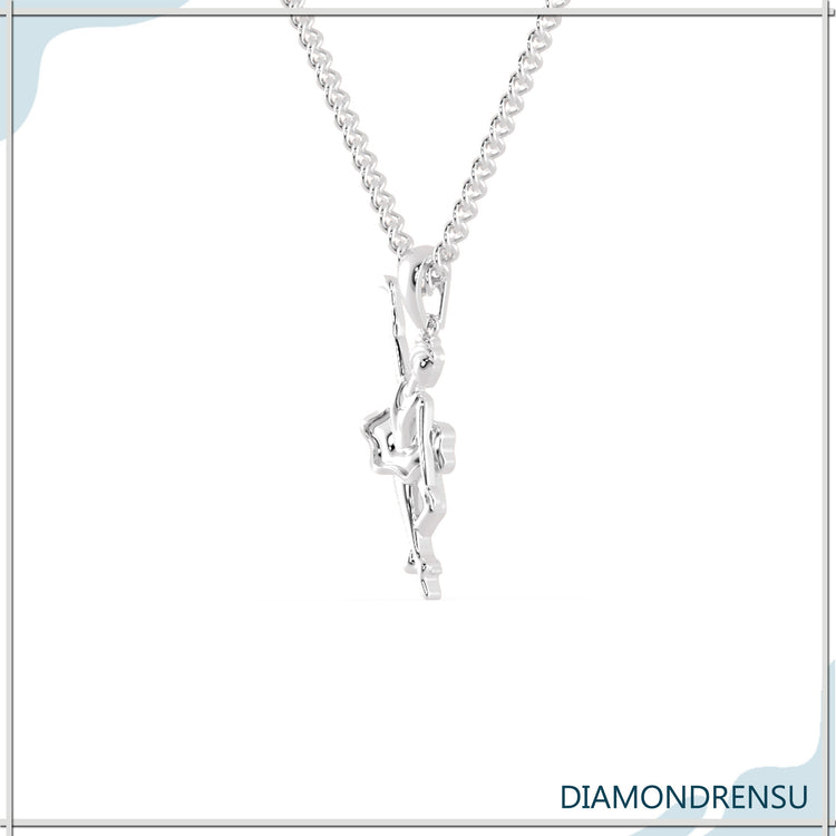 White gold pendant from Diamondrensu UK with angel design.