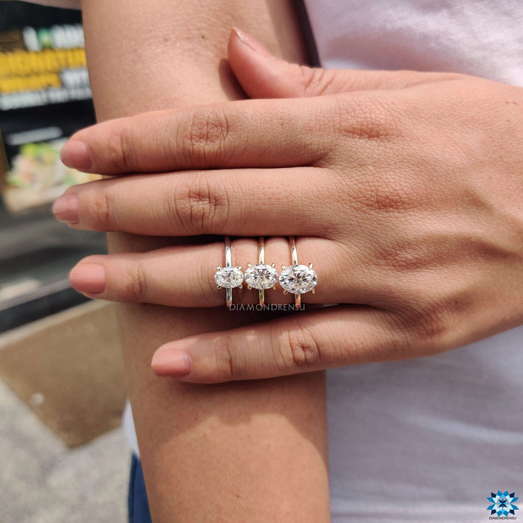 Yellow gold moissanite ring with classic solitaire style.