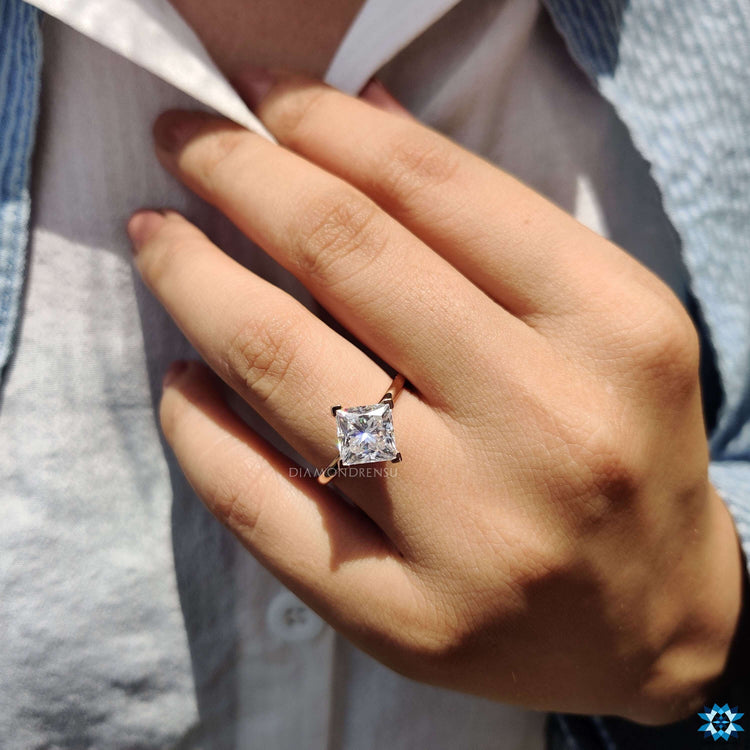 Custom moissanite solitaire ring.