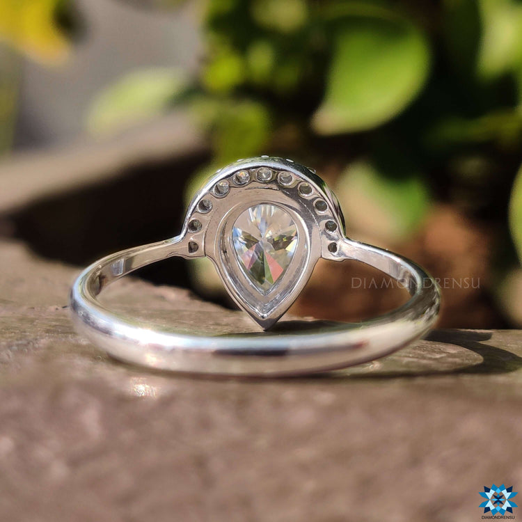Pear cut ring featuring vintage moissanite for a unique touch.