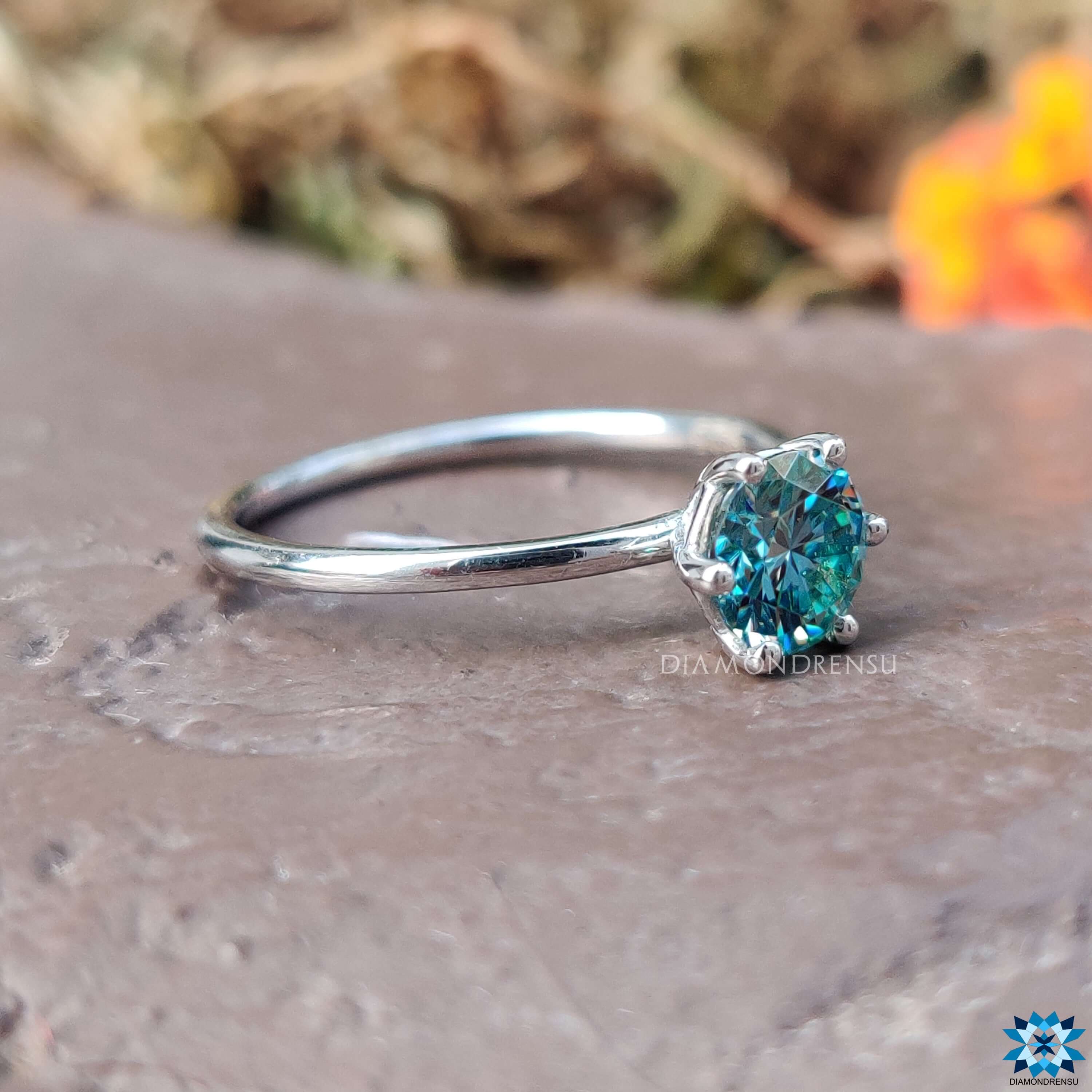 Diamondrensu UK blue moissanite solitaire ring.