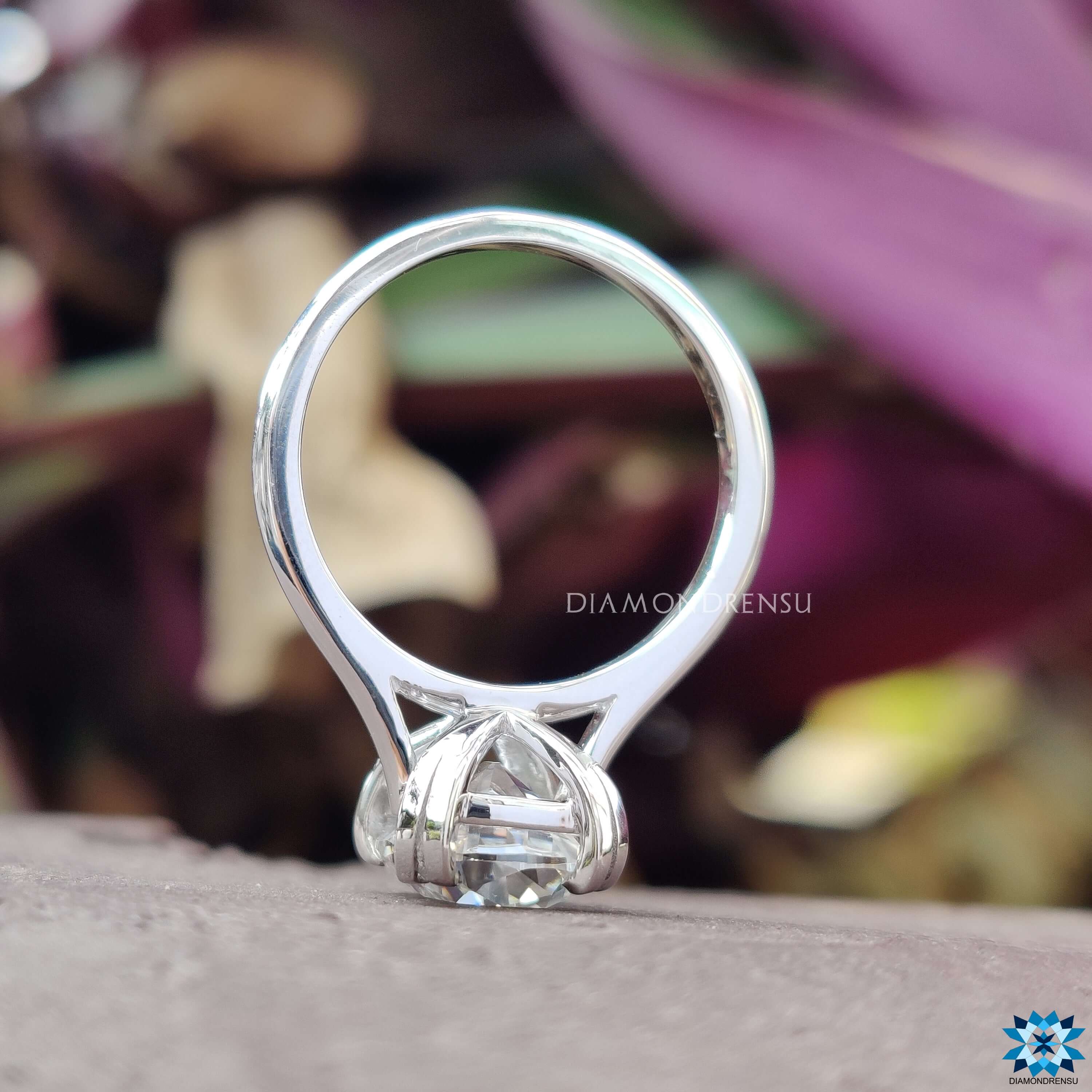 Custom moissanite ring featuring cushion old European cut.