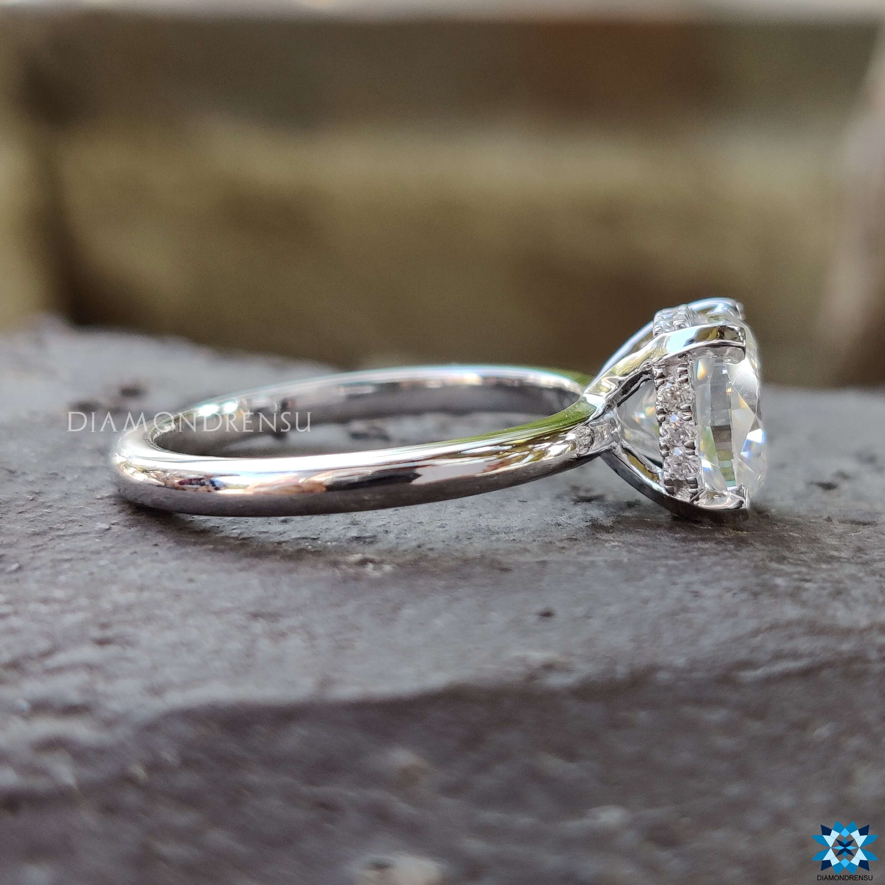 Custom engagement ring with hidden halo setting.