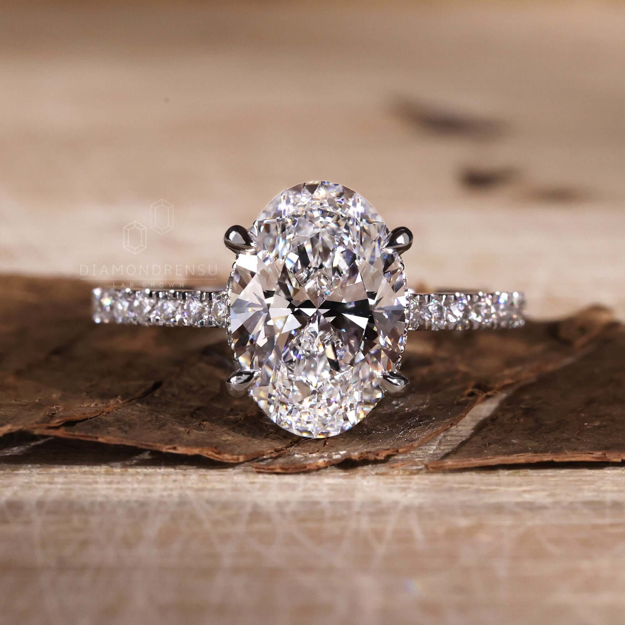 Gold Oval Diamond Engagement Ring showcasing elegance and refinement.