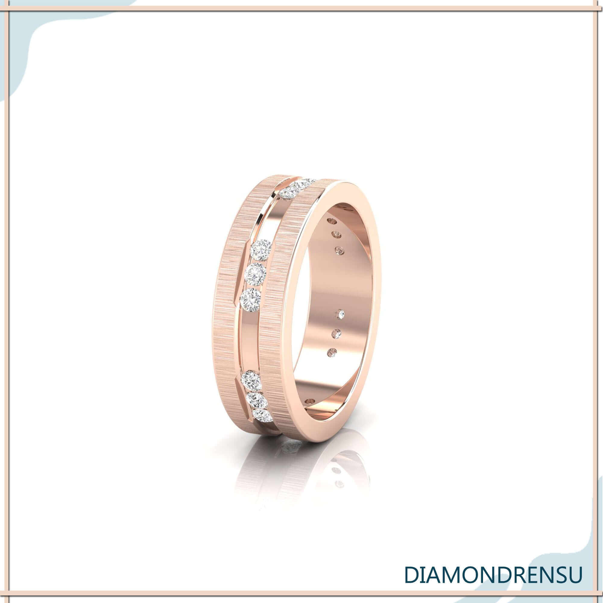 Satin finish band with carved channel band in yellow gold.