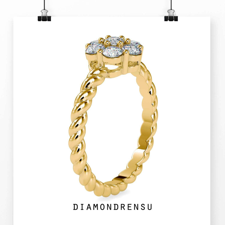 UK engagement ring with custom twisted rope band and cluster halo.