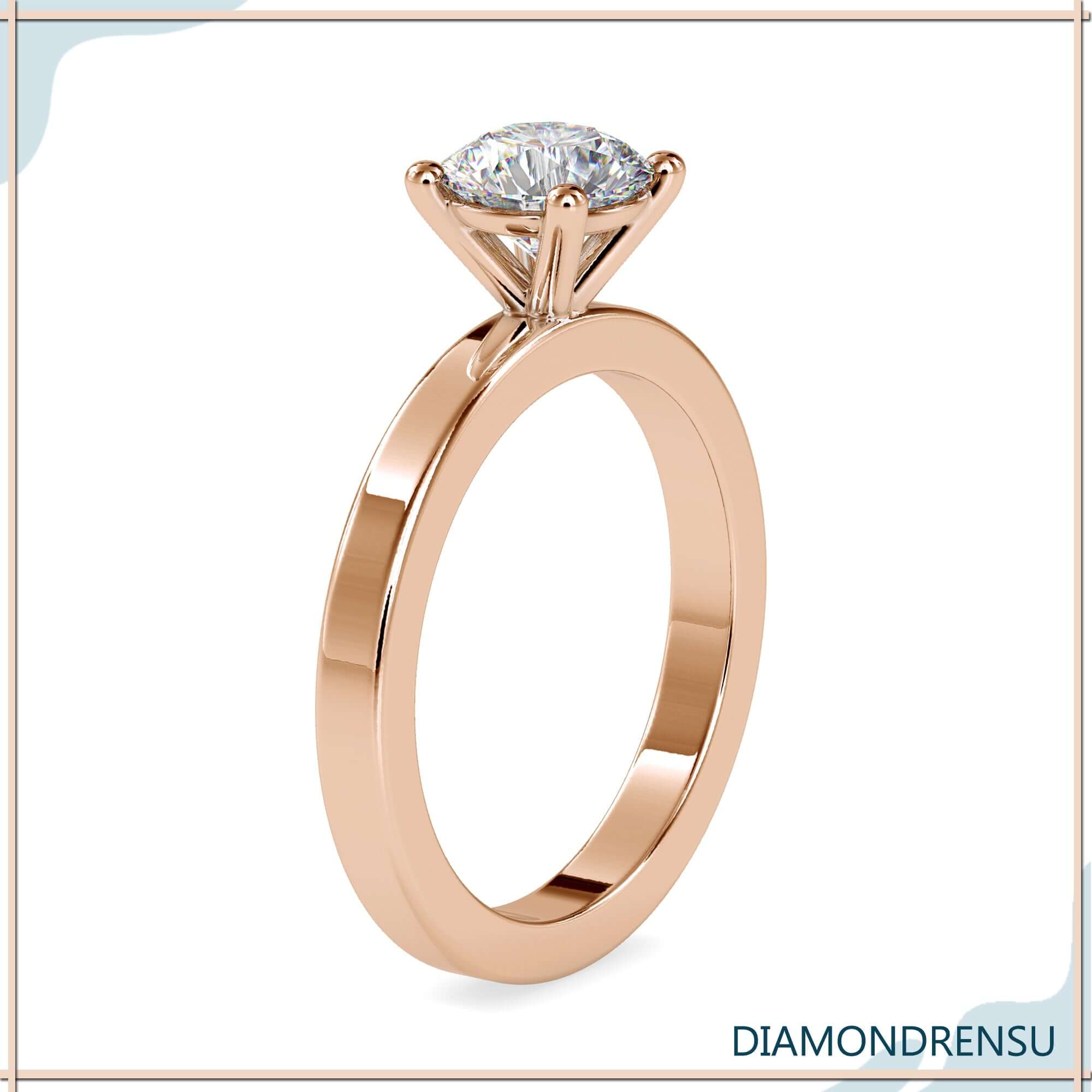 White gold diamond ring with custom solitaire setting.