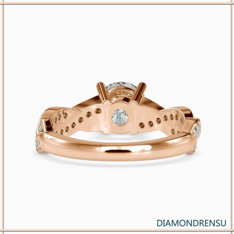 Handmade ring with twisted band and lab grown centre diamond.