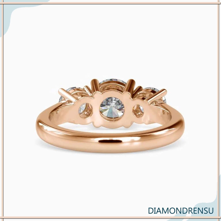 Diamondrensu UK ring with handmade three stone design.