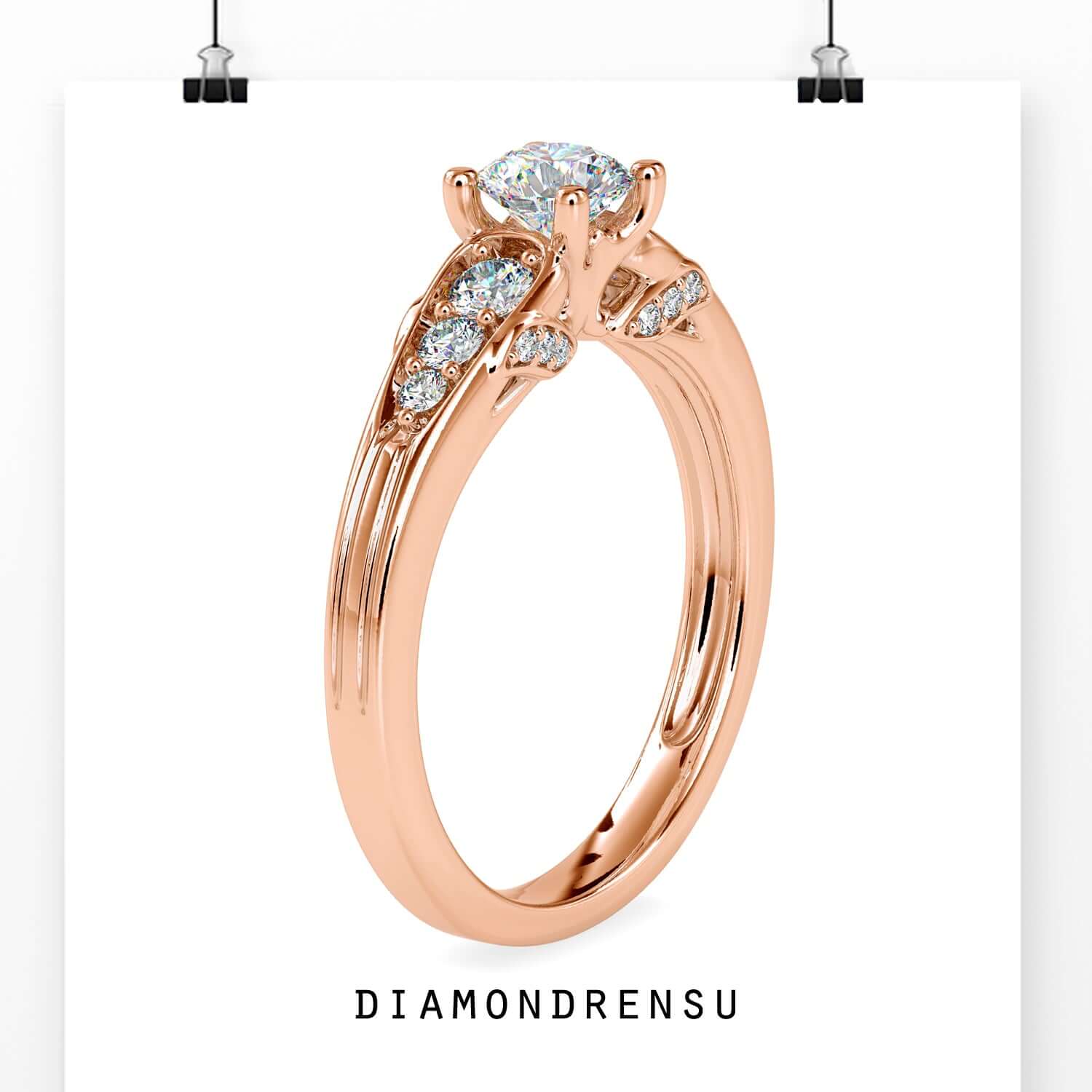 Lab diamond ring with tapered shank and 4 prong mount.