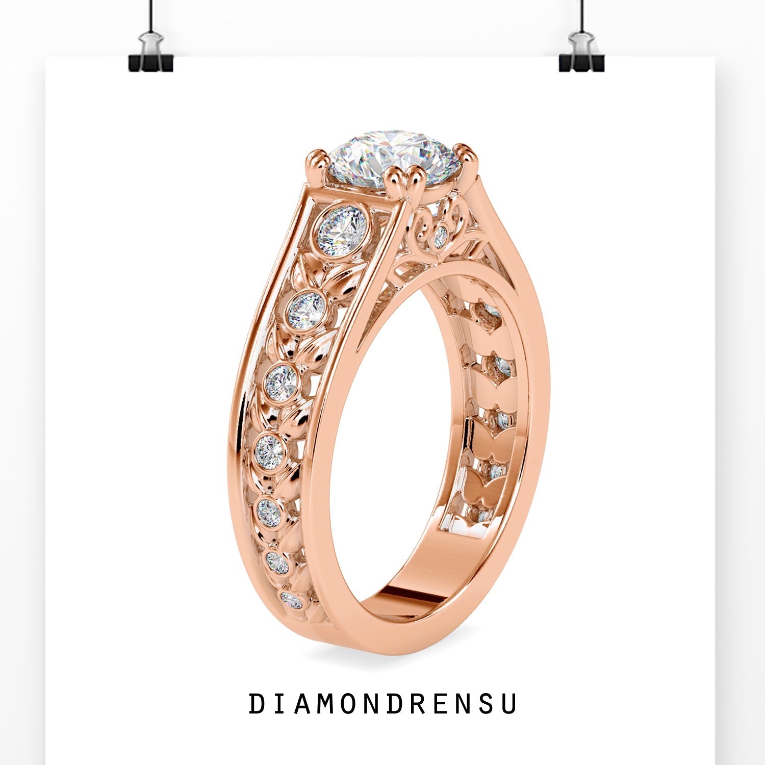Custom engagement ring with round cut and side stones.