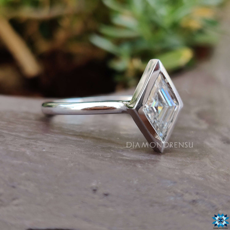 Bezel and prong setting moissanite solitaire ring.