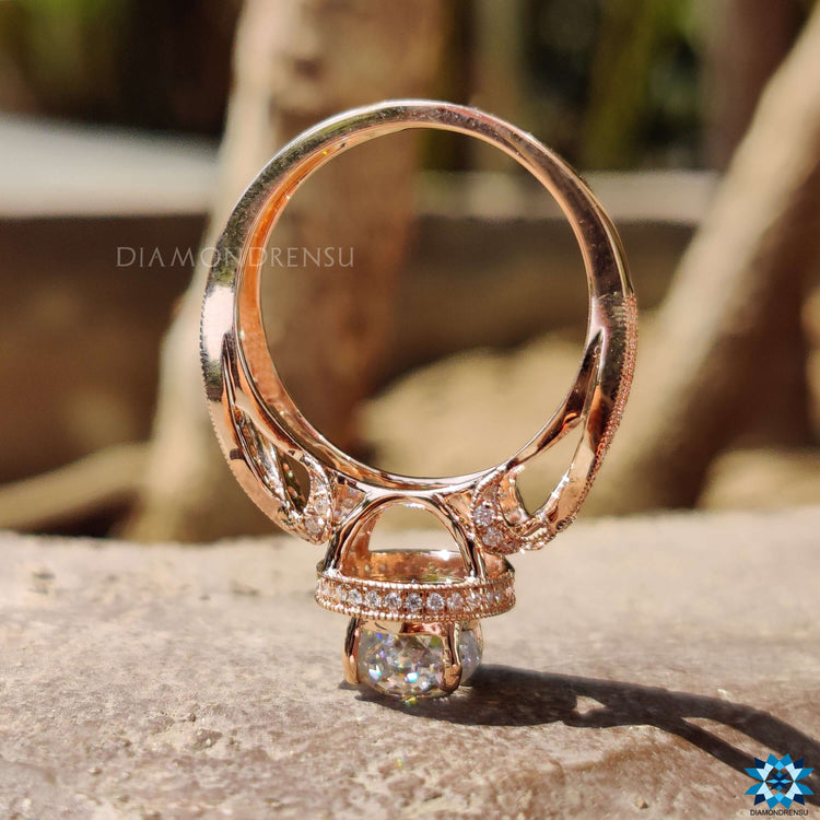 Handmade rose gold ring featuring Portuguese cut moissanite.