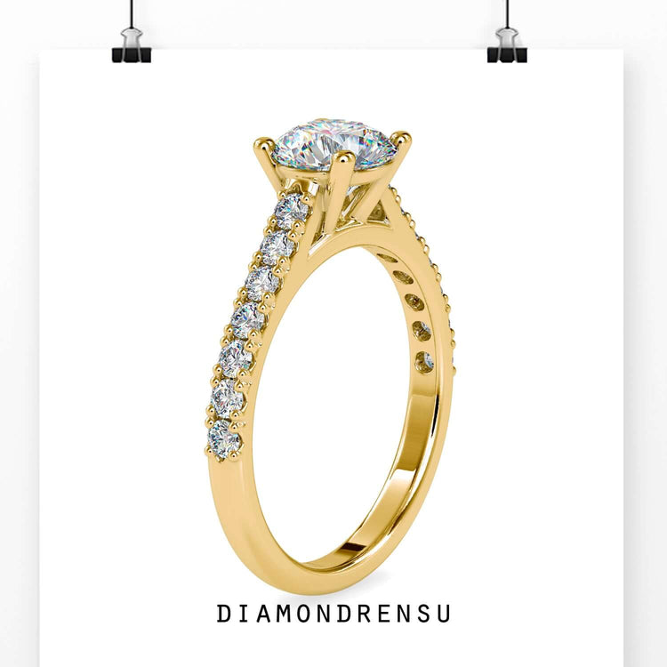 Round four prong setting ring with lab grown diamond in rose gold.