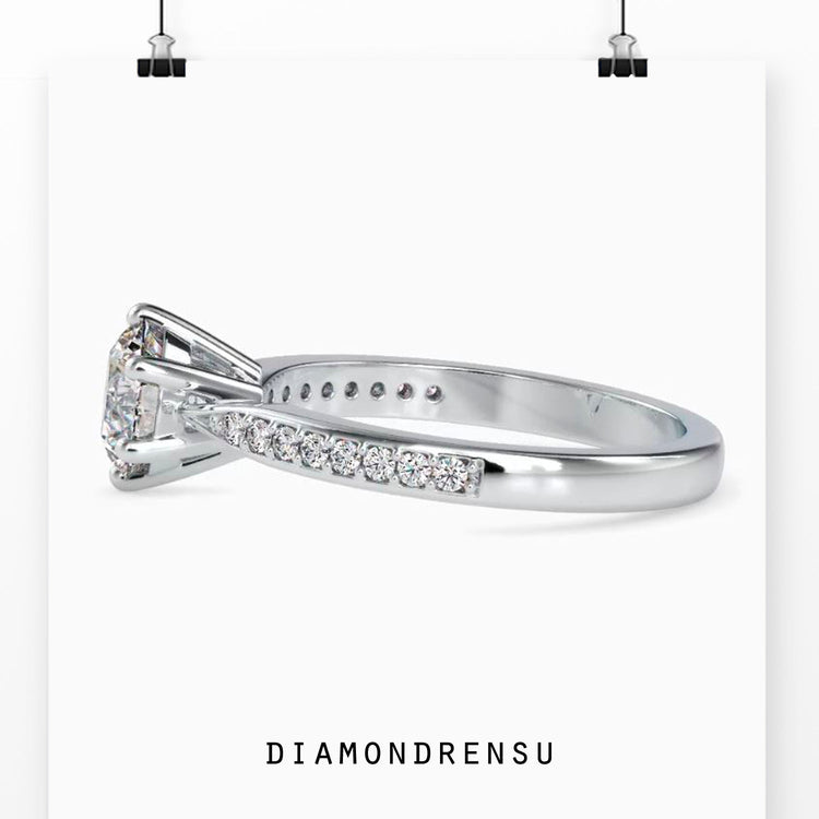 Buy diamond ring featuring lab diamond and tapered pave detail.