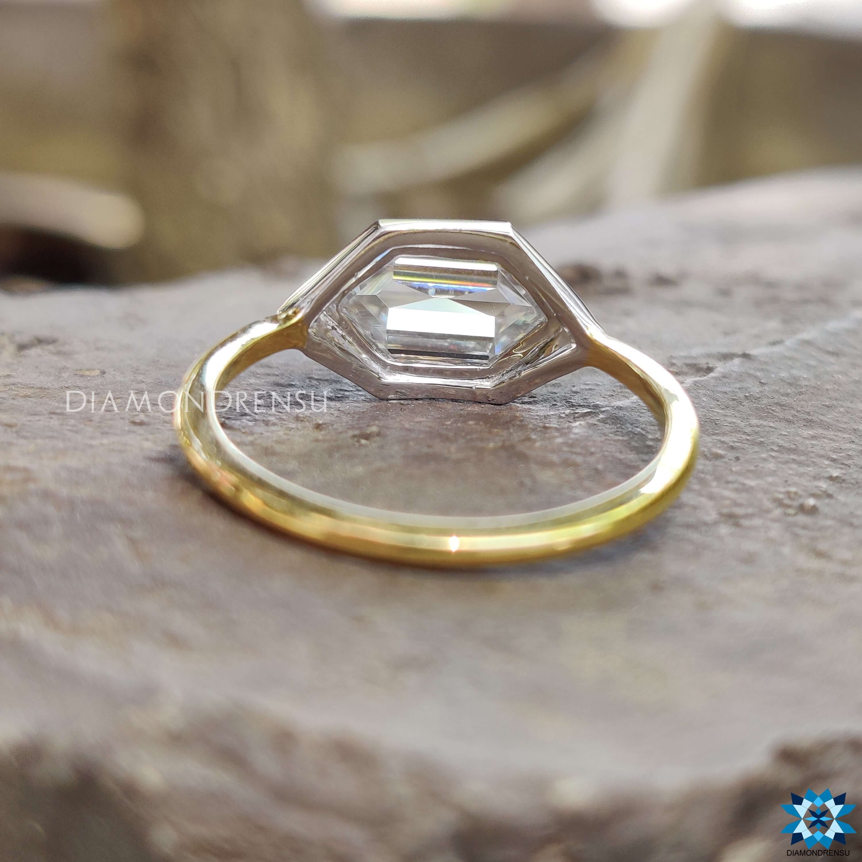 Buy custom bezel set moissanite engagement ring.