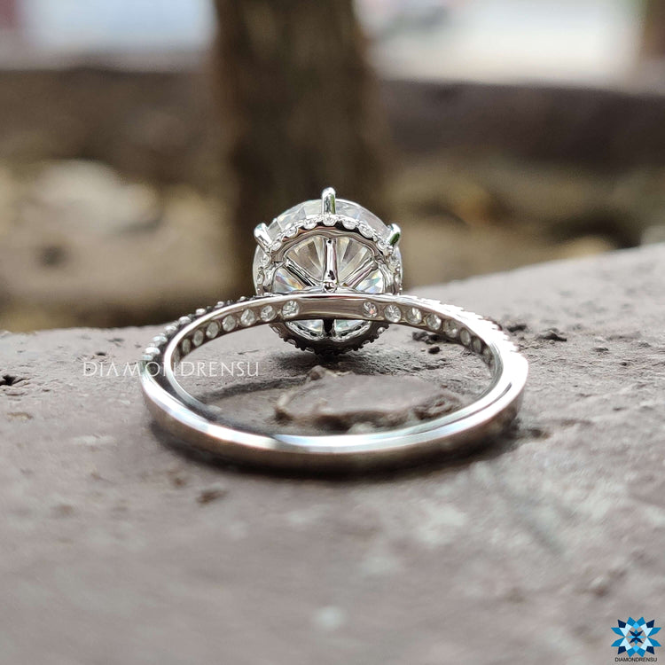 6 prong moissanite engagement ring with hidden halo accent.