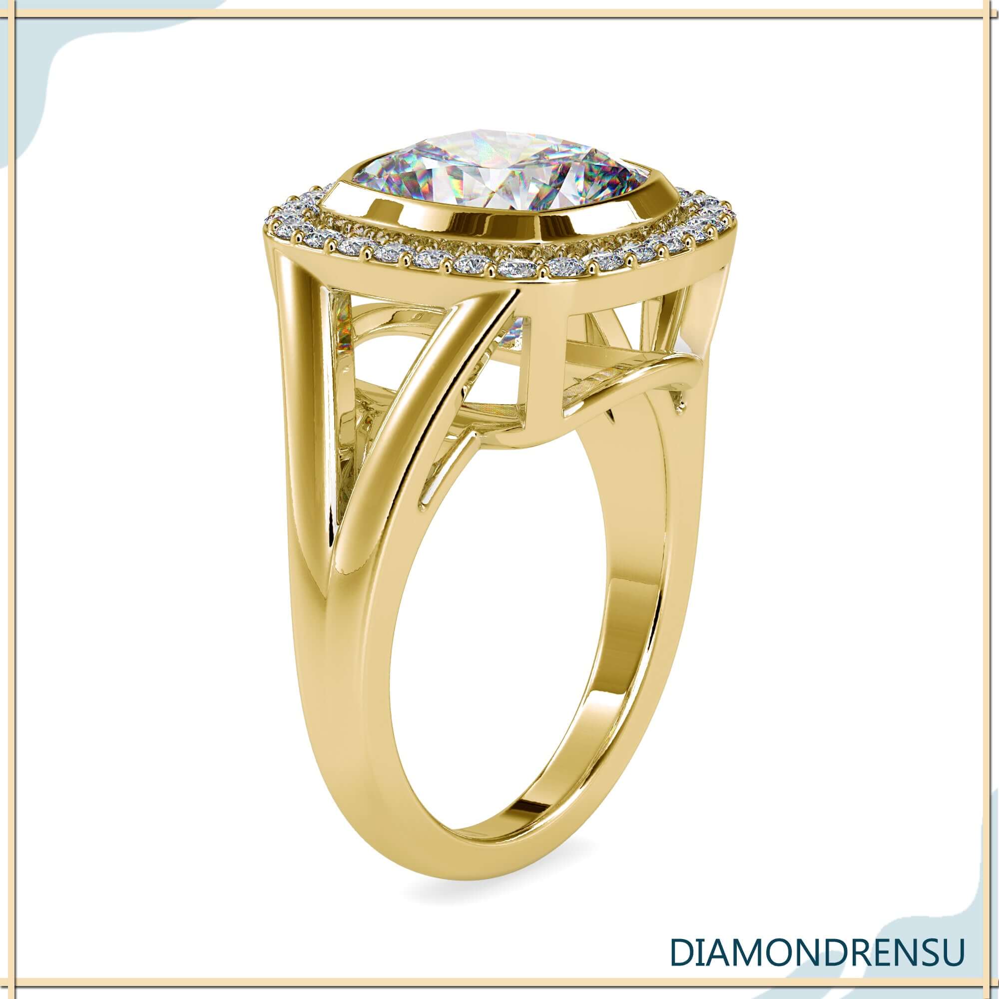 Round cut halo setting with cushion lab grown diamond.