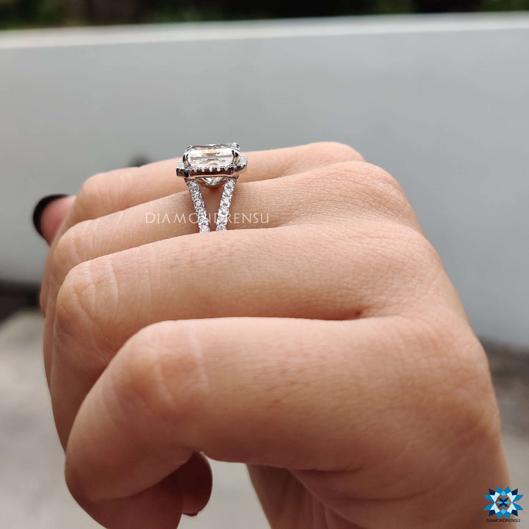 Split shank radiant moissanite ring in prong setting.