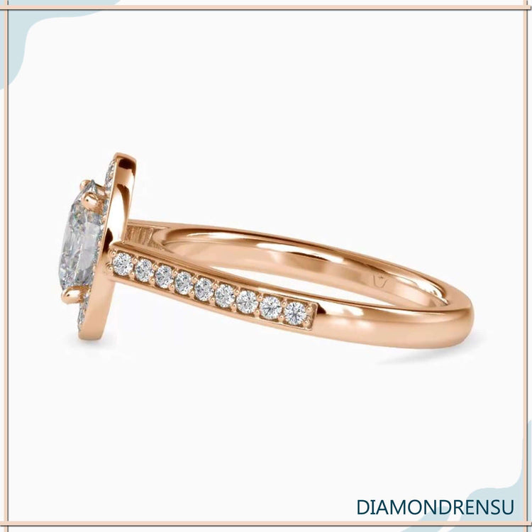 Custom design ring with oval centre and channel set diamonds.