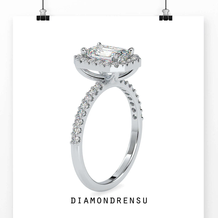 Lab grown diamond ring with emerald cut centre.