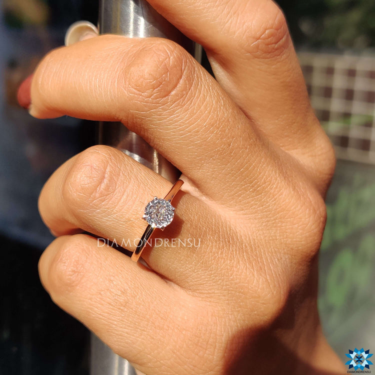 Solitaire engagement ring with Portuguese cut stone.