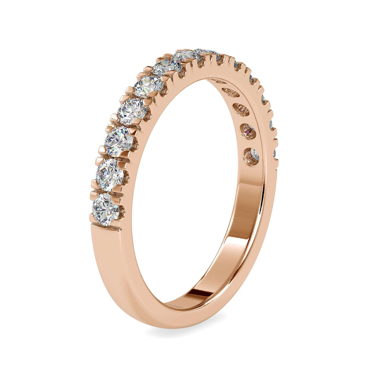 Prong set wedding band made with lab grown diamonds.
