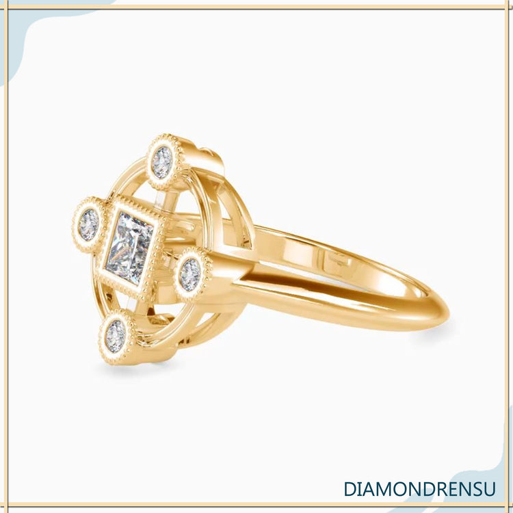 Yellow gold ring with vintage princess cut and milgrain setting.