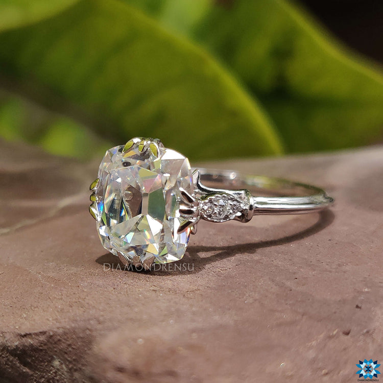 White gold engagement ring with fishtail prong setting.