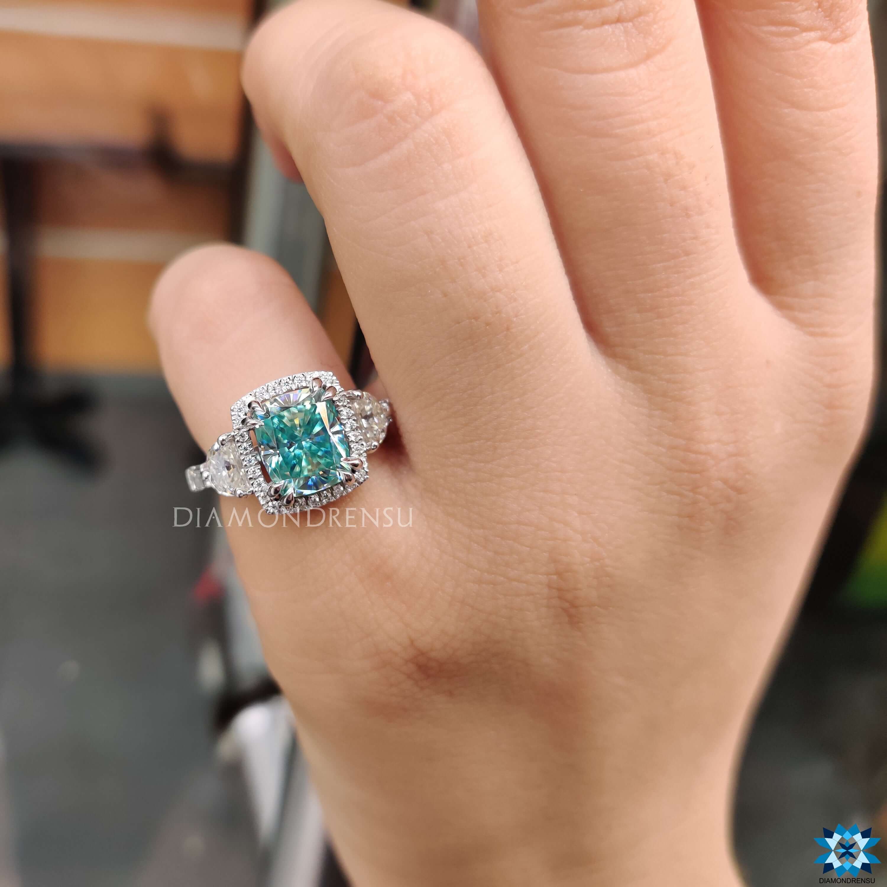 Custom moissanite ring with unique five stone arrangement.