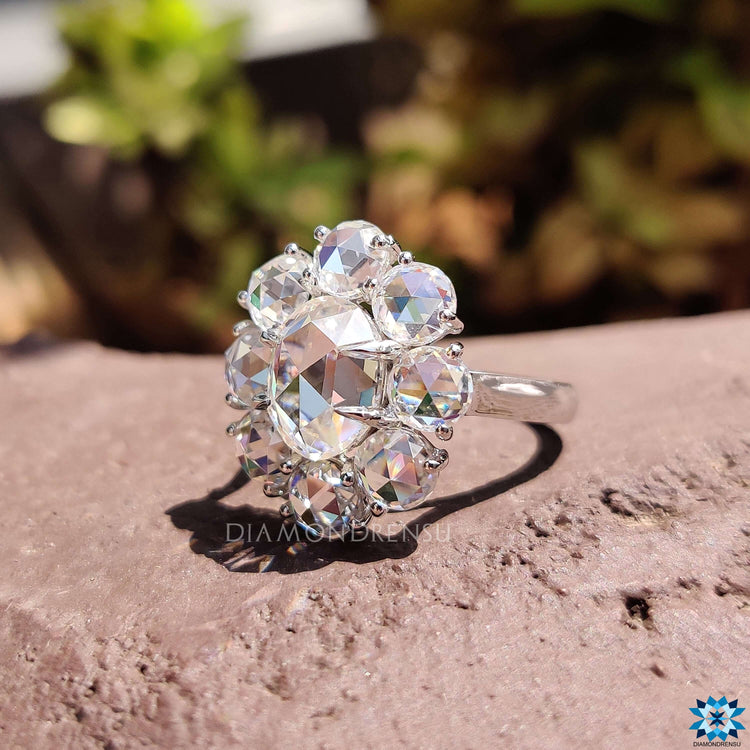 Handmade oval rose cut moissanite ring with halo.