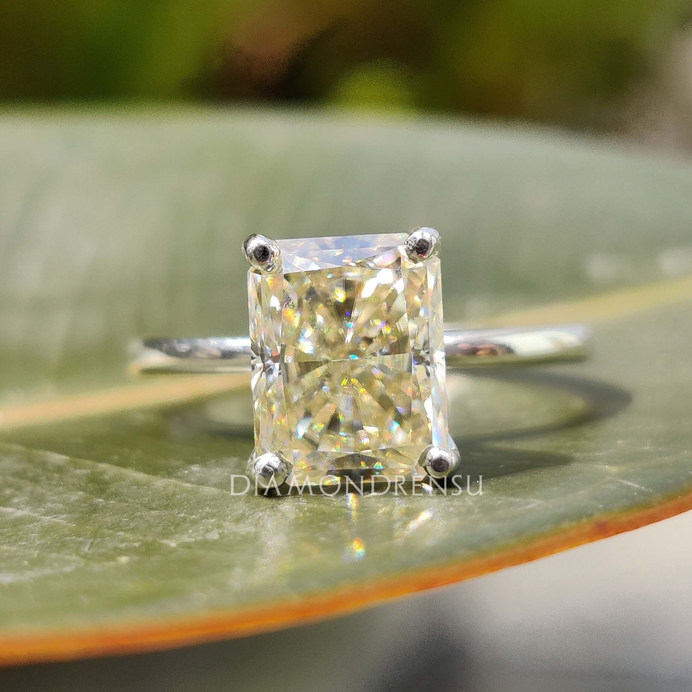 Diamondrensu UK engagement ring with light yellow centre stone in custom design.
