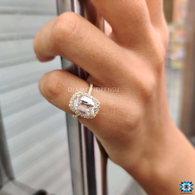 Old European cut moissanite ring with pave setting.