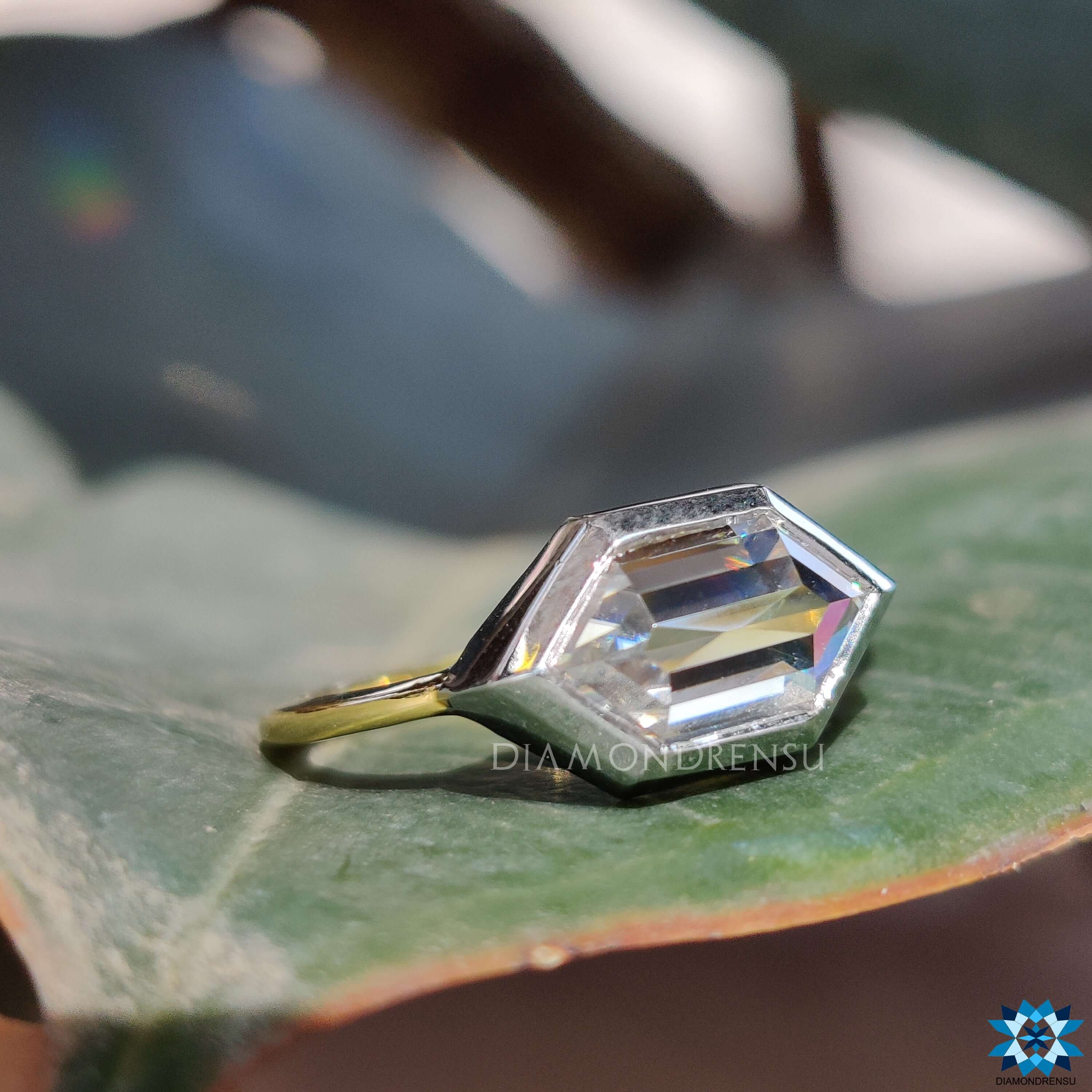 Diamondrensu UK two-tone gold hexagon moissanite ring.