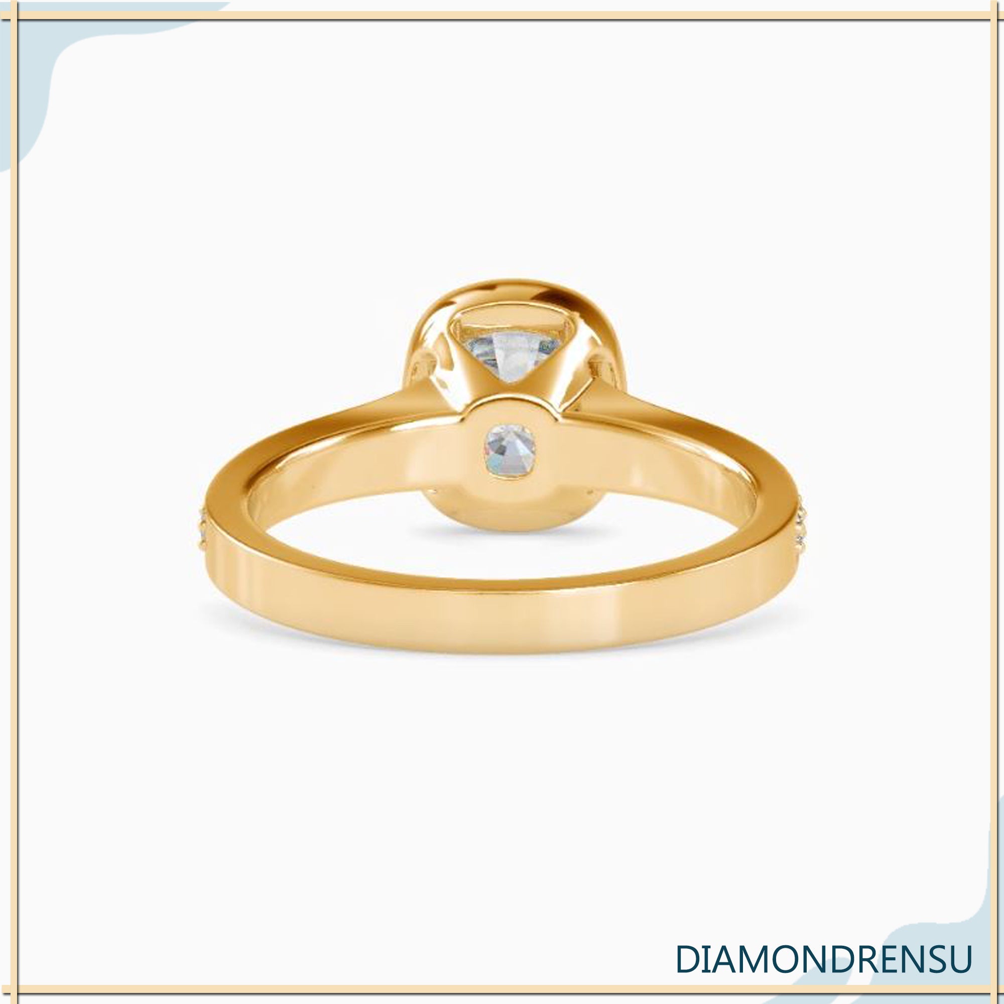 Bezel set cushion cut ring in yellow gold with IGI certification.