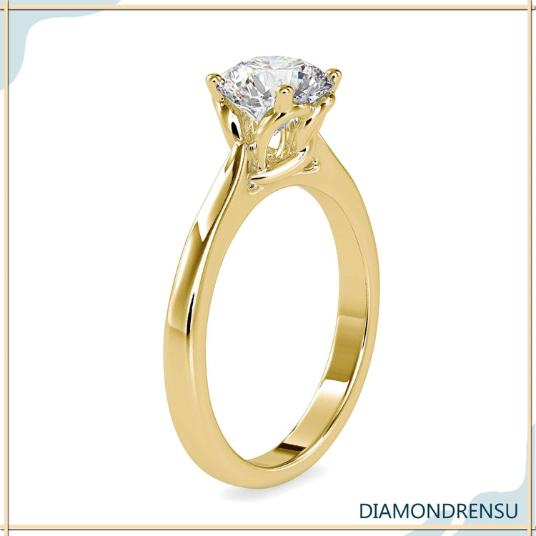 Designer solitaire setting with IGI certified round diamond.