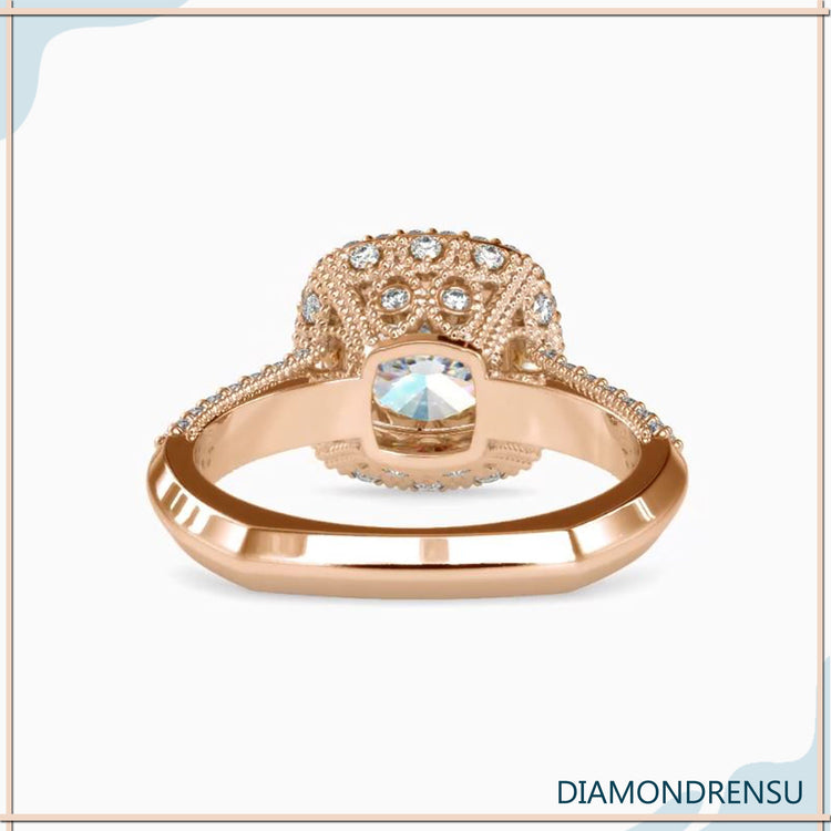 Round cut halo ring with handmade euro shank design.