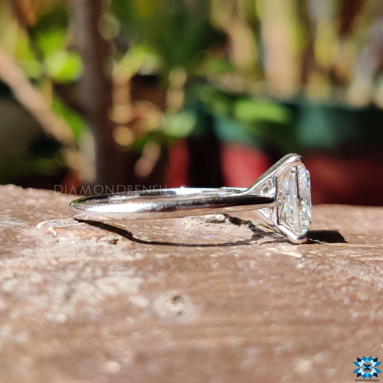 White gold princess cut ring crafted with a cathedral mount for added structure.