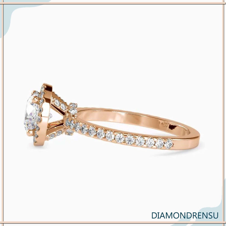 UK diamond ring with round cut and halo setting.