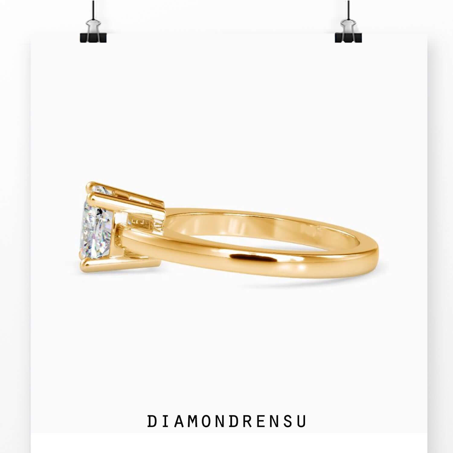 Buy engagement ring with a white gold band and handmade cushion cut diamond setting.