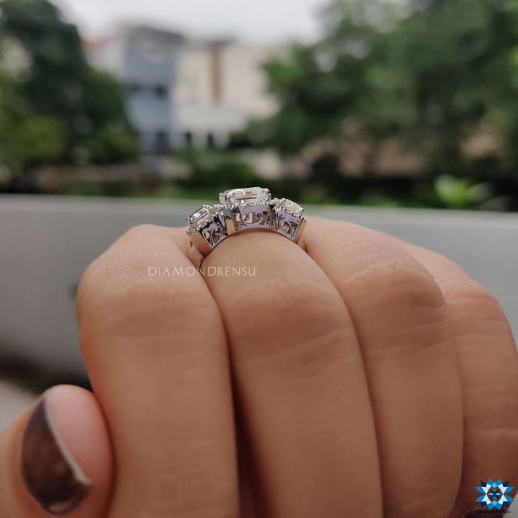 Custom white gold engagement ring with radiant cut moissanite.