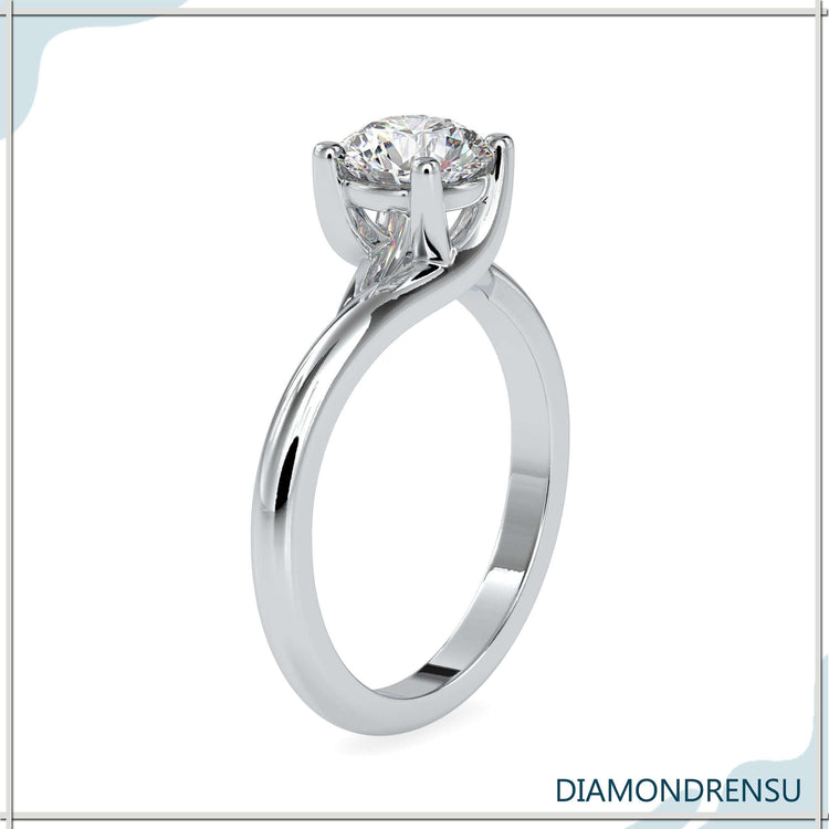 White gold solitaire ring featuring lab grown round diamond.