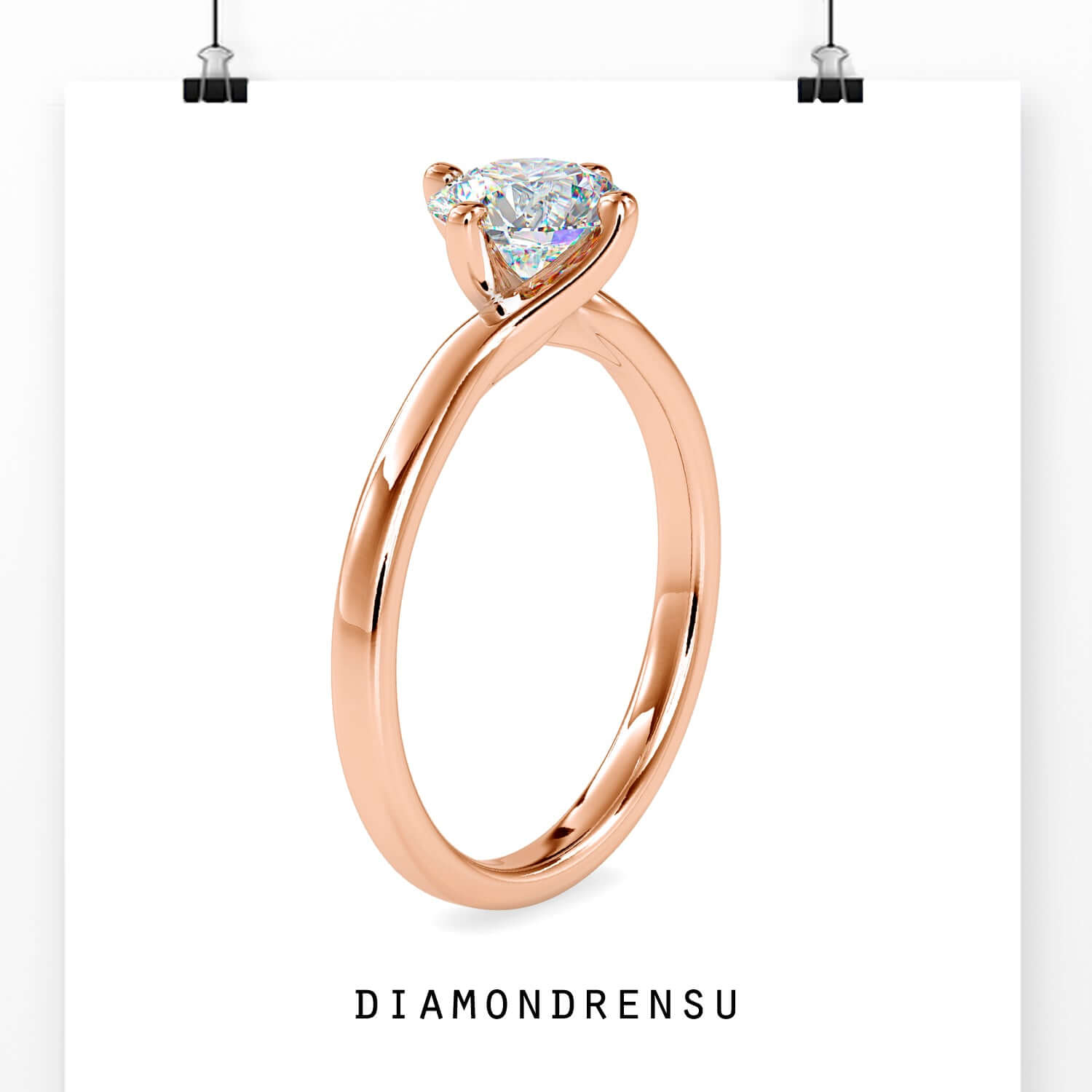White gold engagement ring with solitaire diamond.