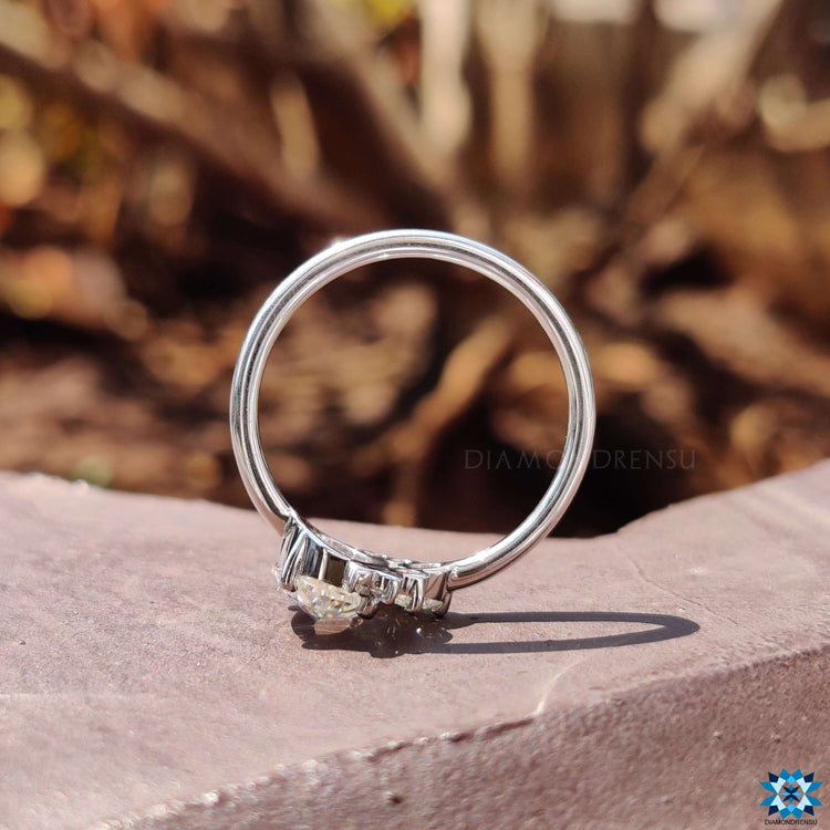 Custom engagement ring with oval moissanite stone.