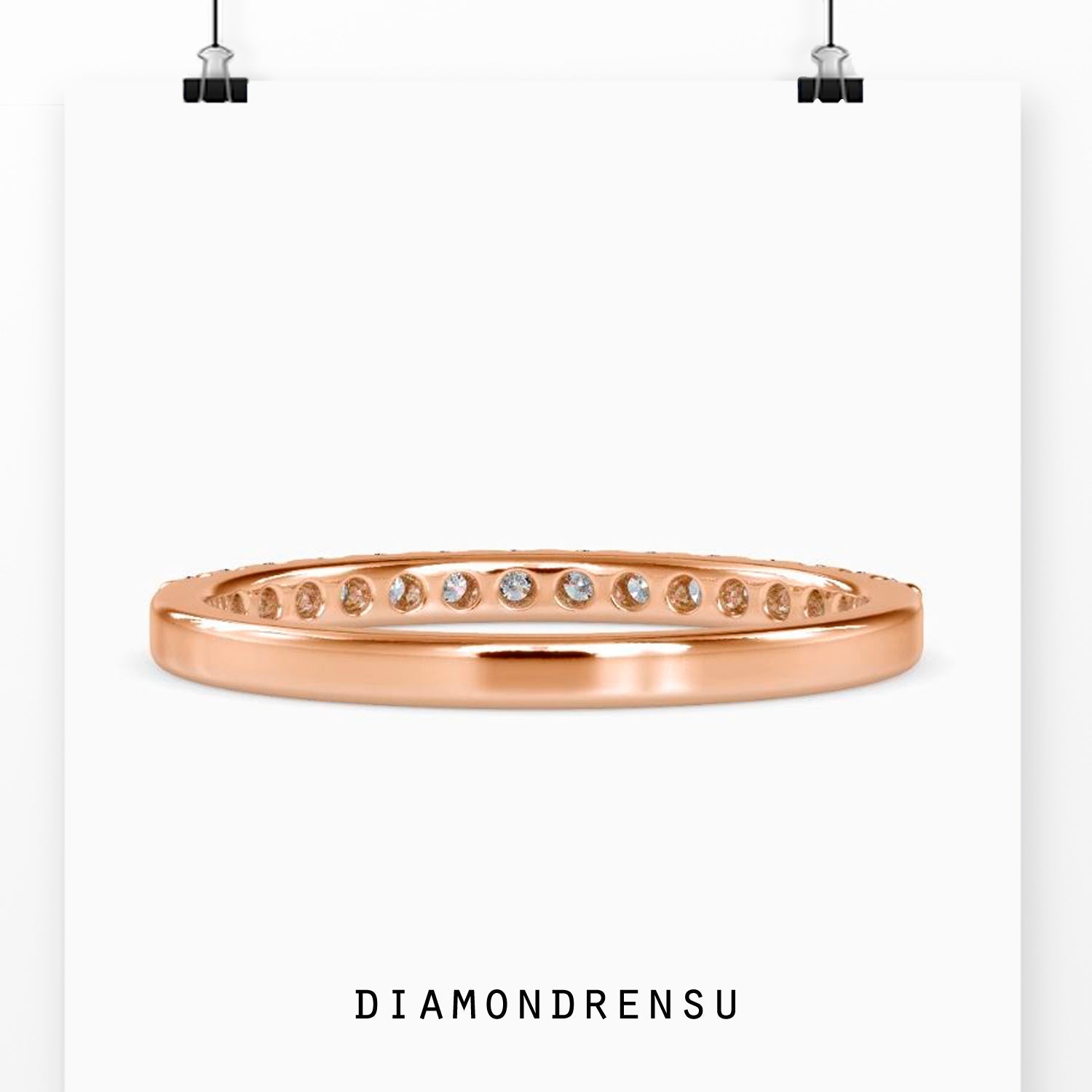 Wedding band in white gold featuring lab grown diamonds.