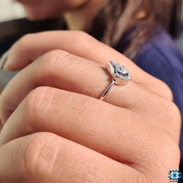 Handmade ring with vintage moissanite and exquisite craftsmanship.