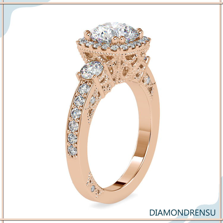 Handmade ring with double prong setting and round stones.