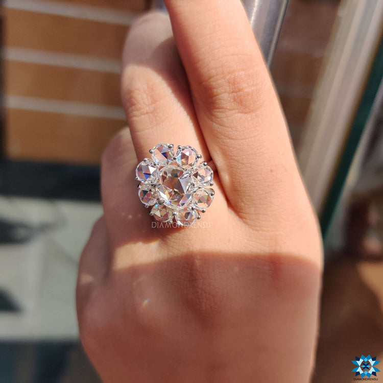Prong set oval rose cut ring in a flower-inspired design.