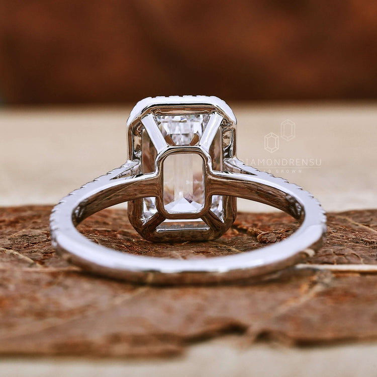 Claw prong engagement ring designed with a 4 prong diamond setting